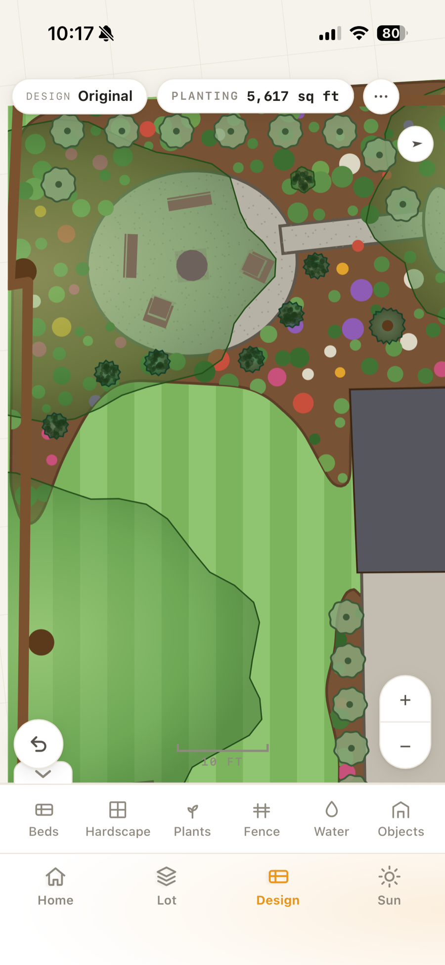 The Ufloria design screen showing the yard traced into beds, lawn, and hardscape on a top-down map